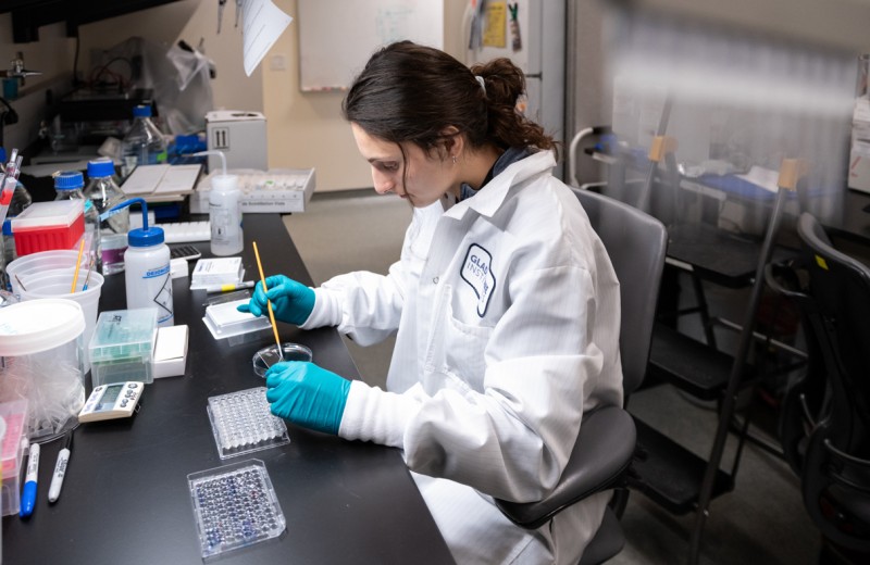 scientist working at a lab bench