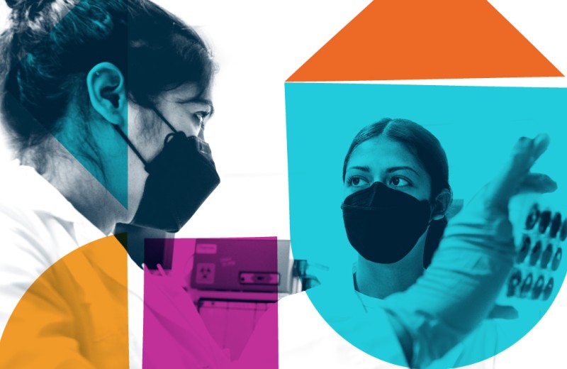 Research Investigator showing something to student intern in the lab